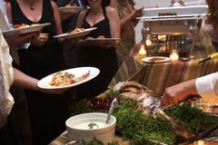 Dinner being served at a wedding