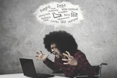 Disabled businessman shouting on the laptop Royalty Free Stock Image Disabled businessman shouting on the laptop Royalty Free Stock Image