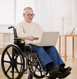 Disabled Man In Wheelchair Using Credit Card Royalty Free Stock Photo Disabled Man In Wheelchair Using Credit Card Royalty Free Stock Photo