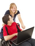 Disabled Teen And Friend On Computer Stock Photos Disabled Teen And Friend On Computer Stock Photos