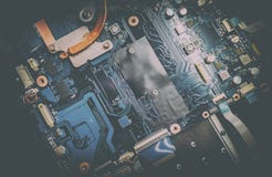 Disassembled laptop. Printed Circuit Board with many electrical components. royalty free stock photo Disassembled laptop. Printed Circuit Board with many electrical components. royalty free stock photo
