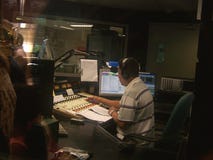 Disc Jockey in Radio Station
