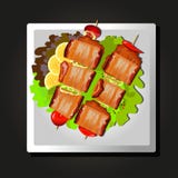 Dish of meat on skewers, tomatoes and herbs on black background. Dish of meat on skewers, tomatoes and herbs Dish of meat on skewers, tomatoes and herbs on black background. Dish of meat on skewers, tomatoes and herbs