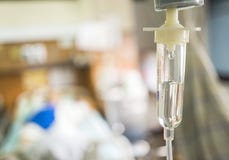 Dispositivo di venipunzione salino del primo piano (iv) per il paziente in ospedale fotografia stock libera da diritti Dispositivo di venipunzione salino del primo piano (iv) per il paziente in ospedale fotografia stock libera da diritti