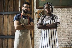 Diverse business owners standing together stock photos Diverse business owners standing together stock photos