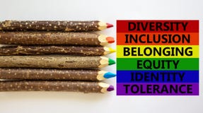Diversity inclusion belonging equity identity tolerance words written on beautiful white background. Wooden pencils. Diversity,