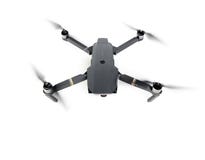 DJI Mavic Pro drone in flight, on white background. royalty free stock photo DJI Mavic Pro drone in flight, on white background. royalty free stock photo