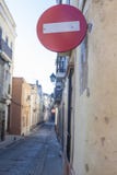 Do not enter traffic signs perspective at old town streets Royalty Free Stock Image Do not enter traffic signs perspective at old town streets Royalty Free Stock Image
