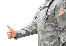 Docteur de l'armée américaine montrant le pouce image libre de droits Docteur de l'armée américaine montrant le pouce image libre de droits