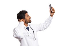 Docteur prenant le selfie avec le téléphone photo stock Docteur prenant le selfie avec le téléphone photo stock