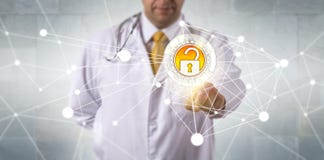 Doctor Accessing Data Via Secure Network stock images Doctor Accessing Data Via Secure Network stock images