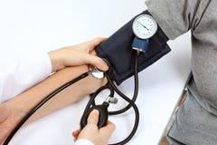 Doctor Checking Blood Pressure With Stethoscope Royalty Free Stock Images Doctor Checking Blood Pressure With Stethoscope Royalty Free Stock Images