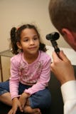 Doctor Checks Young Patient