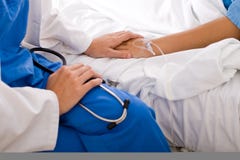 Doctor comforting patient stock images Doctor comforting patient stock images