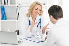 Doctor consulting patient royalty free stock photos Doctor consulting patient royalty free stock photos