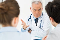 Doctor discussing with patients