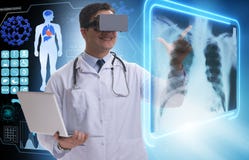 The doctor examining x-ray images using virtual reality glasses royalty free stock images The doctor examining x-ray images using virtual reality glasses royalty free stock images