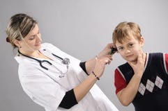 Doctor Examining White Boy Stock Images Doctor Examining White Boy Stock Images