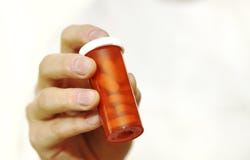 Doctor Holding Bottle Of Prescription Pills Stock Images Doctor Holding Bottle Of Prescription Pills Stock Images