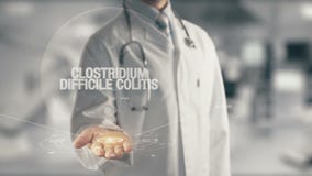 Doctor holding in hand Clostridium Difficile Colitis royalty free stock photography Doctor holding in hand Clostridium Difficile Colitis royalty free stock photography