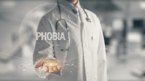 Doctor holding in hand Phobia Royalty Free Stock Photography Doctor holding in hand Phobia Royalty Free Stock Photography