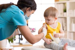 A doctor makes a vaccination to a child royalty free stock images A doctor makes a vaccination to a child royalty free stock images