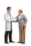 Doctor and a mature man shaking hands royalty free stock images Doctor and a mature man shaking hands royalty free stock images