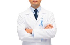Doctor with prostate cancer awareness ribbon stock photography Doctor with prostate cancer awareness ribbon stock photography
