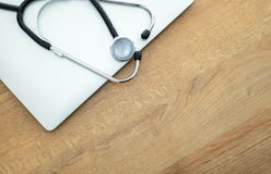 Doctor`s stethoscope and laptop computer stock images Doctor`s stethoscope and laptop computer stock images