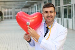 Doctor showing a strong healthy heart royalty free stock images Doctor showing a strong healthy heart royalty free stock images