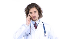 Doctor talking on smartphone royalty free stock image Doctor talking on smartphone royalty free stock image