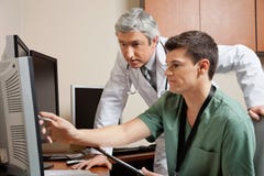 Doctor And Technician Working Together royalty free stock image Doctor And Technician Working Together royalty free stock image
