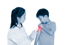 Doctor vaccinating boy`s arm. Asian boy worry about vaccine syri royalty free stock images Doctor vaccinating boy`s arm. Asian boy worry about vaccine syri royalty free stock images