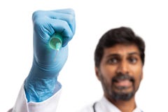 Doctor vaccinating with focused expression royalty free stock photos Doctor vaccinating with focused expression royalty free stock photos
