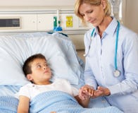 Doctor Visiting Child Patient On Ward stock images Doctor Visiting Child Patient On Ward stock images