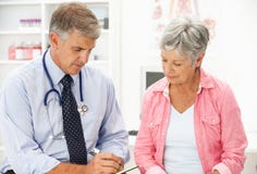 Doctor With Female Patient Stock Photos Doctor With Female Patient Stock Photos