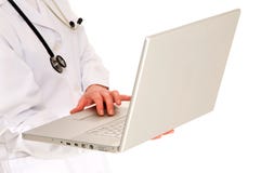 Doctor With Stethoscope Holding A Laptop Stock Photo