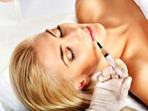 Doctor Woman Giving Botox Injections. Stock Photos Doctor Woman Giving Botox Injections. Stock Photos