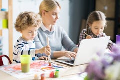 Doing homework with mother stock photography Doing homework with mother stock photography