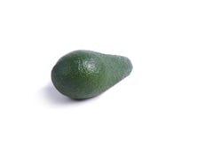 Dojrzała avocado owoc na tle zdjęcie stock Dojrzała avocado owoc na tle zdjęcie stock