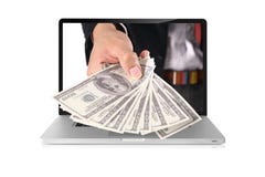 Dollar auf Laptop stockbilder Dollar auf Laptop stockbilder