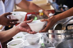 Donate food to the beggar. charity concept stock image Donate food to the beggar. charity concept stock image