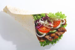 Doner z piec na grillu mięsnym i świeżym sałatkowym plombowaniem zdjęcia stock Doner z piec na grillu mięsnym i świeżym sałatkowym plombowaniem zdjęcia stock