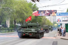 Donetsk, Donetsk People Republic, Ukraine – May 9, 2019: Column of military technics driving through the main street of the stock photography Donetsk, Donetsk People Republic, Ukraine – May 9, 2019: Column of military technics driving through the main street of the stock photography