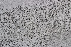 Donkergrijs schuim concreet close-up, textuur, achtergrond, materiaal met exemplaarruimte royalty-vrije stock afbeeldingen Donkergrijs schuim concreet close-up, textuur, achtergrond, materiaal met exemplaarruimte royalty-vrije stock afbeeldingen