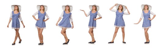 Donna sorridente in vestito semplice e cappello dal plaid isolati sul briciolo Fotografia Stock Libera da Diritti Donna sorridente in vestito semplice e cappello dal plaid isolati sul briciolo Fotografia Stock Libera da Diritti