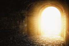 Door to Heaven. Arched passage open to heaven`s sky.Light at end of the tunnel. Light at end of the tunnel.