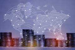 Double exposure of coin stack with city background and world map, financial graph, world map and global network business concept royalty free stock image Double exposure of coin stack with city background and world map, financial graph, world map and global network business concept royalty free stock image