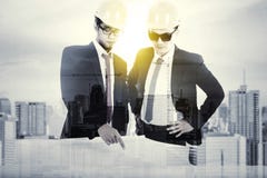 Double exposure of two engineer with blueprint Stock Photography Double exposure of two engineer with blueprint Stock Photography