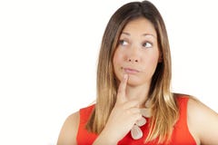 Doubt thinking female decision expression. Woman with finger on lips Stock Photos Doubt thinking female decision expression. Woman with finger on lips Stock Photos